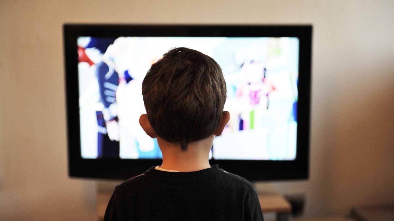 Child watching TV image