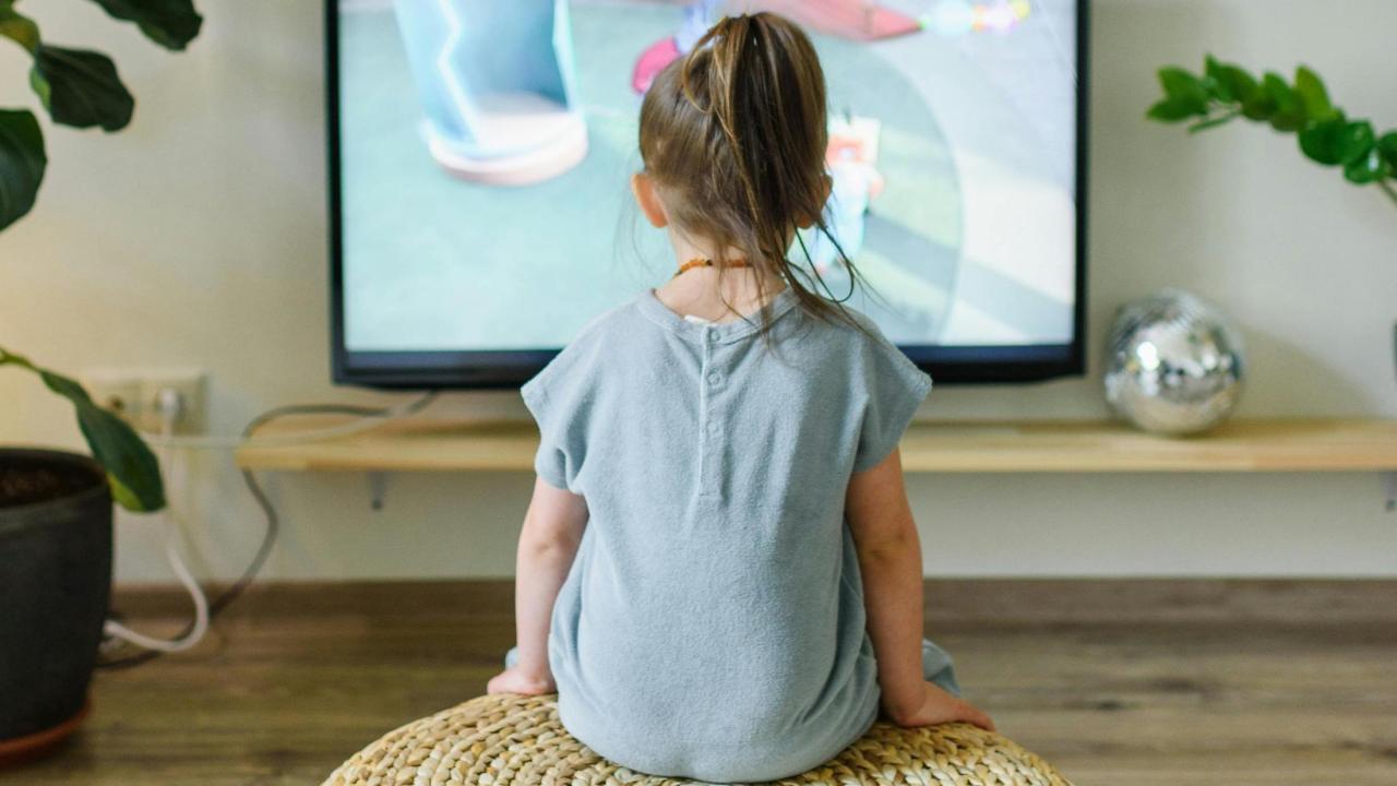 Child watching TV image