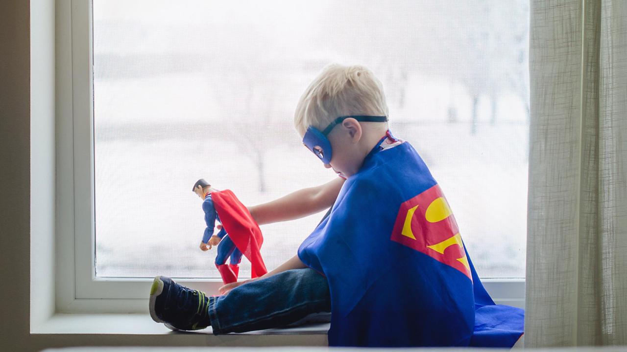 Child in superhero costume