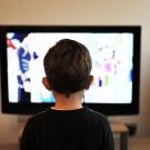 Child watching TV image