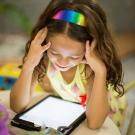 Child on tablet image